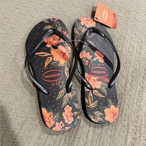 Havaianas Black Flip Flops with Coral Tag